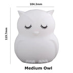 White owl-shaped night light with measurements on a white background
