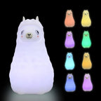 Llama-shaped night light with multiple color options on a black background