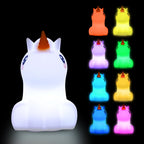 Unicorn-shaped night light with multiple color options on a black background