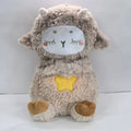 Plush toy sheep with a white face and brown body on a light gray background