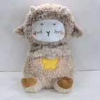 Plush toy sheep with a white face and brown body on a light gray background